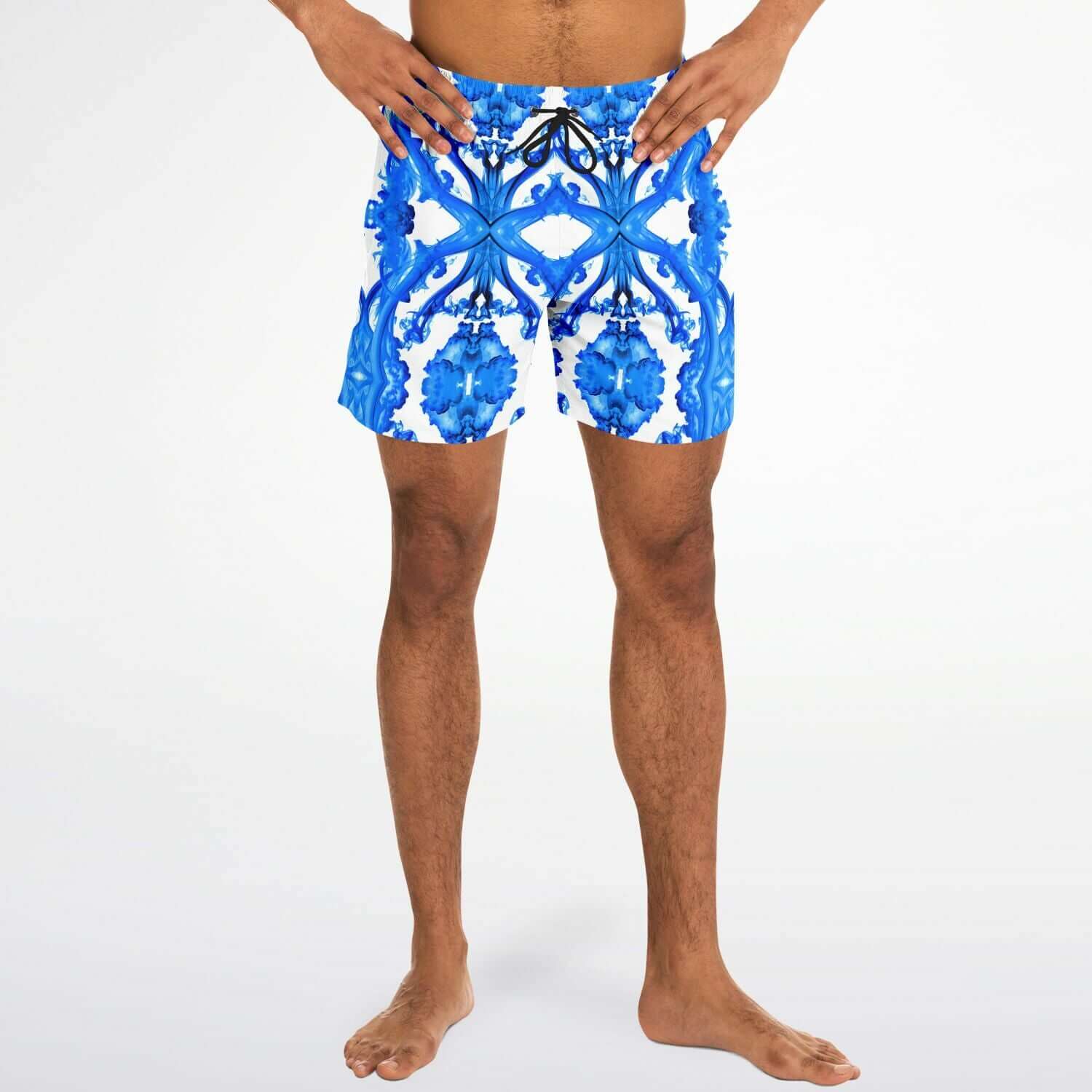 Ocean Blue Cymatic Men’s Swim Shorts on a model, featuring a stylish design and quick-dry fabric for performance.