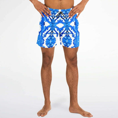 Ocean Blue Cymatic Men’s Swim Shorts on a model, featuring a stylish design and quick-dry fabric for performance.